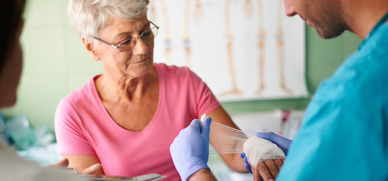 Woman’s-arm-being-bandaged